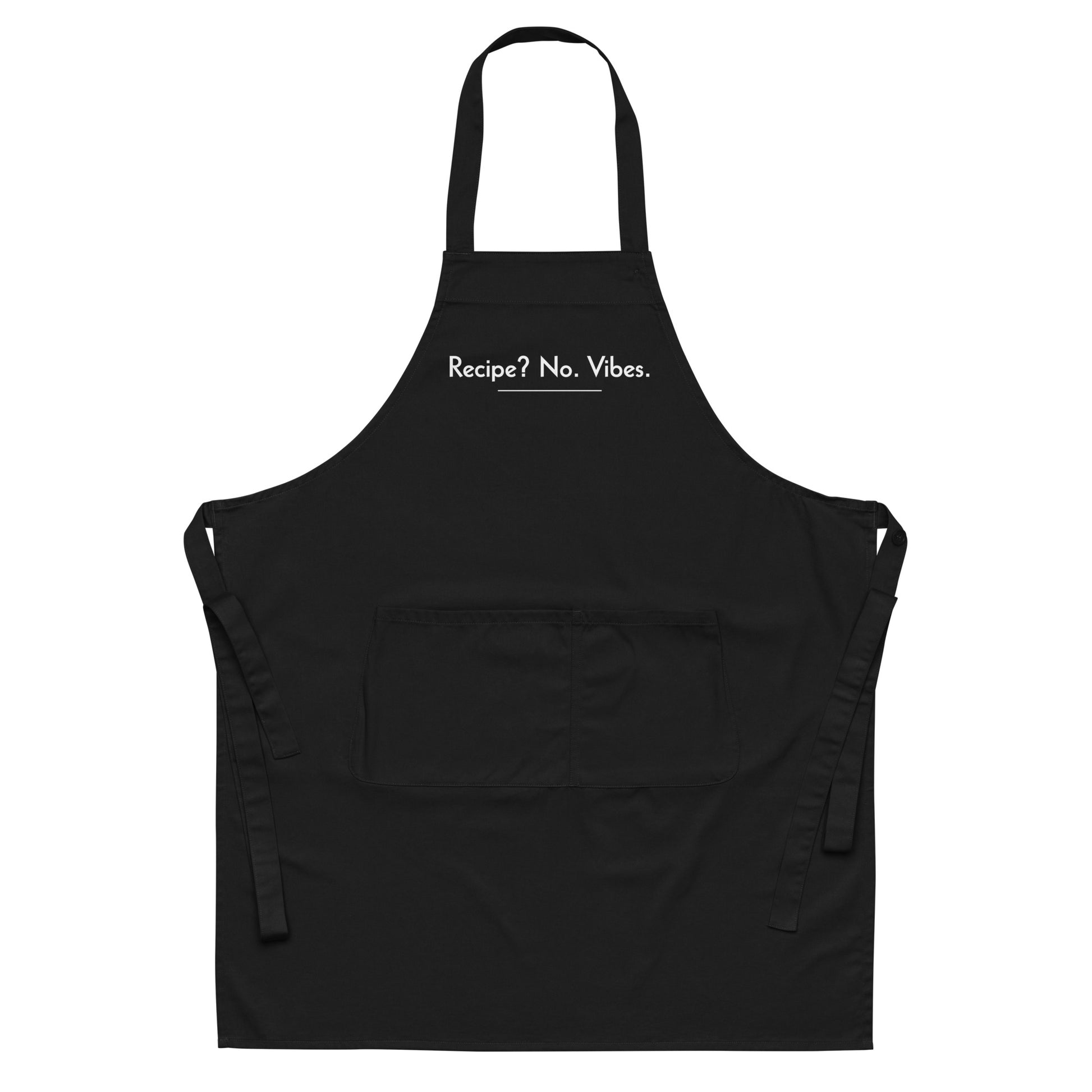 Black kitchen apron with the text “Recipe? No. Vibes.” printed on the front in bold white letters.