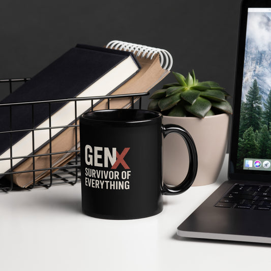 Black ceramic mug with the bold Gen X statement “Survivor of Everything” in white print, photographed as a clean product mockup with modern retro vibe.